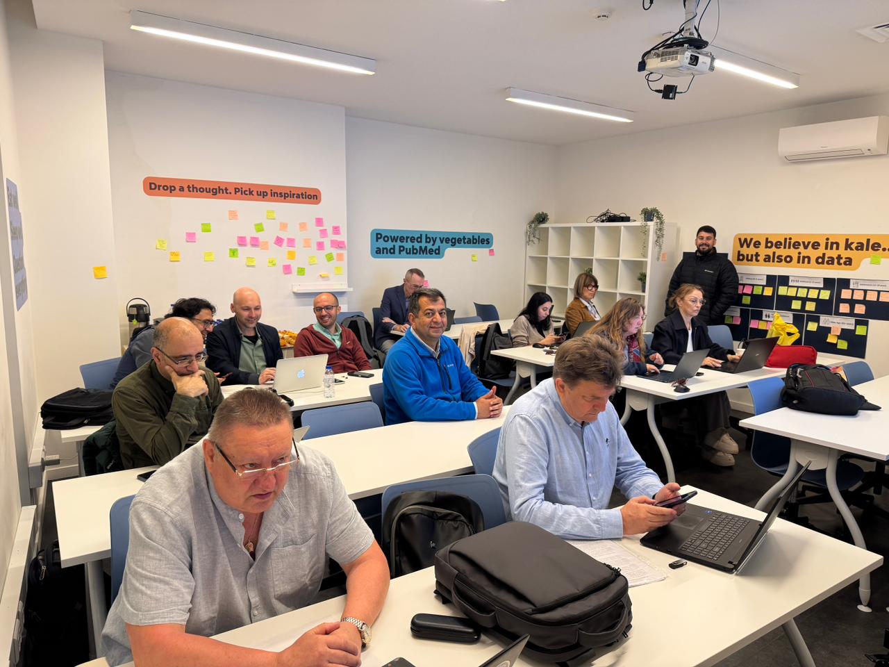 Participants seated in a classroom during the Beyond Epicenters kick-off meeting