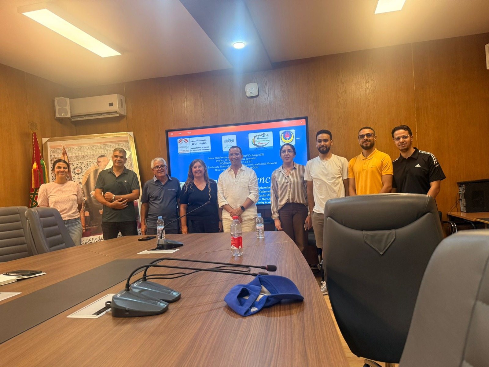 Beyond Epicenters colleagues gathered for a group photo in the meeting room
